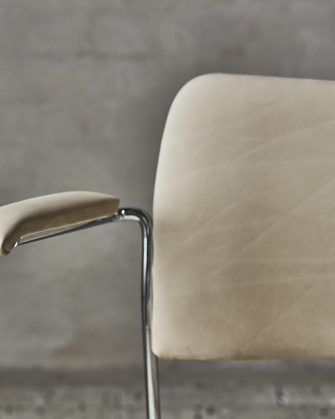 A detailed image of the armrest of the 40/4 chair